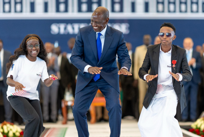 President William Ruto dancing alongside two youths during the launch of the Next Generation of Kenya Youth Employment Programme.